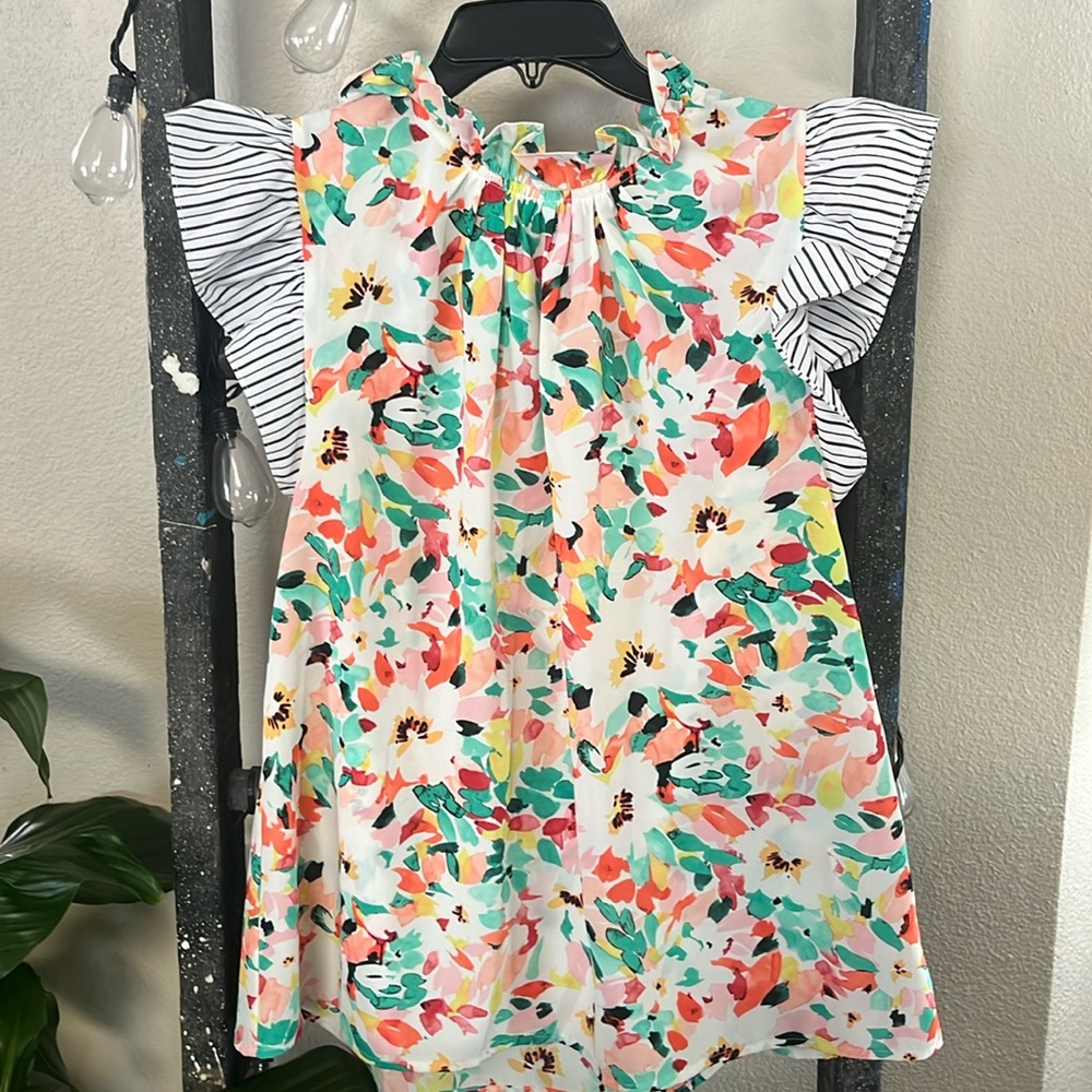 Cute silky top with ruffle sleeves and ruffle neck